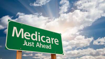 photo of a sign stating Medicare just ahead