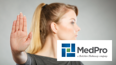 photo of a woman with her hand in the stop pose