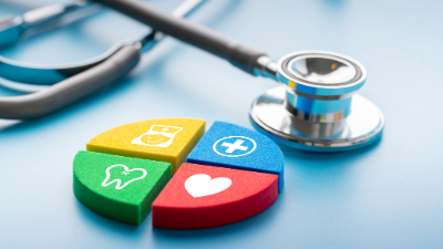 photo of a stethoscope and four colored blocks